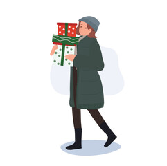 Christmas Joy concept. Happy Woman in Winter Attire with Gift Boxes