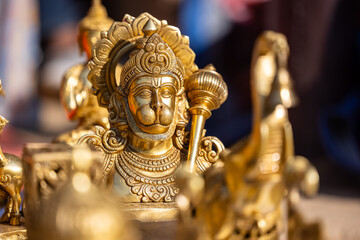 Brass metal art, Handmade Indian cultural and hindu god sculpture souvenir made with brass with plain background. Selective focus.