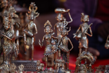 Brass metal art, Handmade Indian cultural sculpture souvenir made with brass with plain background. Selective focus.