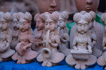 Mud and Clay products of human musicians on display at Surajkund Craft Fair.