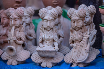 Mud and Clay products of human musicians on display at Surajkund Craft Fair.
