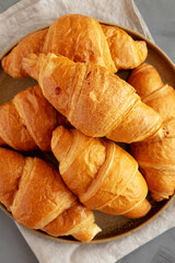 Homemade Croissants on a Plate, top view. Flat lay, overhead, from above.