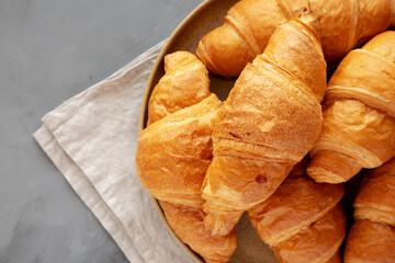 Homemade Croissants on a Plate, top view. Flat lay, overhead, from above. © Liudmyla