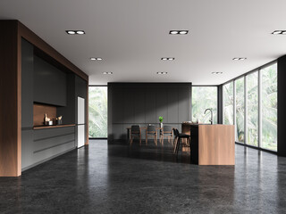 Modern home kitchen interior with eating table and bar counter with window