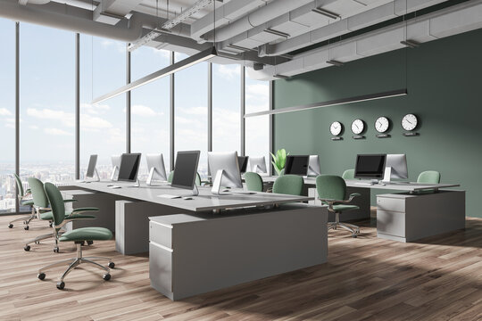 Stylish workspace interior with pc monitors, world clock and window