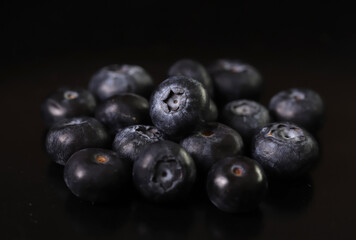 Blueberries isolated on black background