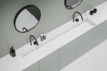 Top view of bathroom interior with sink and two mirrors, accessories