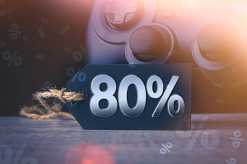 80 percent discount on video game sale. Black friday. Sale of goods for game consoles.