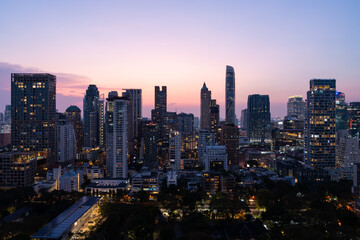 Fototapeta premium Bangkok city skyline with skyscrapers in evening