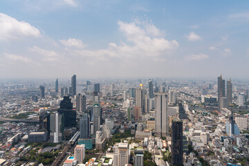 Fototapeta na wymiar Panoramic Bangkok city view, houses and office skyscrapers