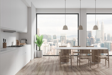 White home kitchen interior with cooking and eating room, panoramic window