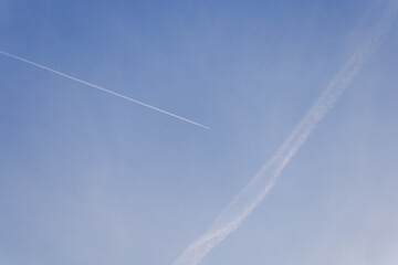 Fototapeta na wymiar Traces of airplanes in the sky