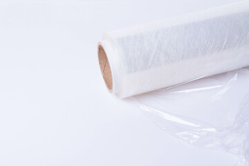Packing the goods in a cardboard box and stretch film. Tools for packing parcels at the post office.