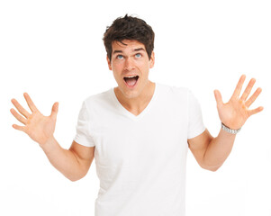 Studio, man and surprise with hands up, excited and mouth open with isolated on white background. Happy person, shocked face and amazing news in mockup for deal, announcement and omg gesture or wtf