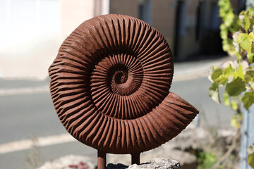 Clam shell made of rusty metal
