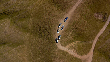 Cars from above on dirt road, Namibia, Africa