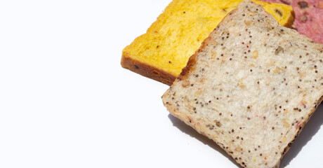 Whole grain bread slices on white background.