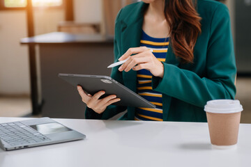 Working Process in Modern Office. Young Woman Account Manager Working at Table with New Business Project. Typing keyboard Laptop. Horizontal..