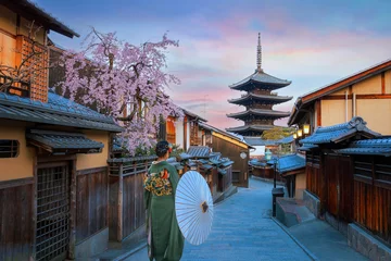 Papier Peint photo Lavable Gris 2 Kyoto, Japan - March 30 2023: The Yasaka Pagoda  known as Tower of Yasaka or Yasaka-no-to. The 5-story pagoda is the last remaining structure of Hokan-ji Temple which is built in the 6th-century