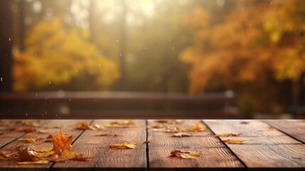 Naklejka na ściany i meble Wooden table with blurred autumn background