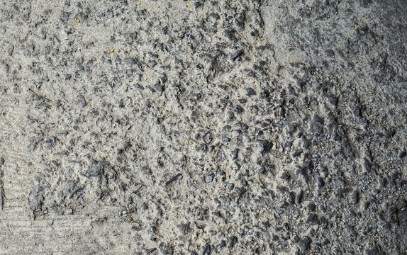 texture of the stone with pebbles..
