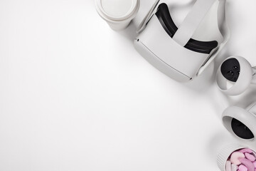 VR glasses with controller by marshmallows on desk