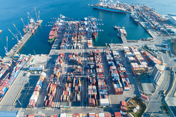 Obraz premium Container ship docked in port as seen from above