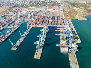 Container ship docked in port as seen from above