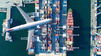 Logistics and transportation of Container Cargo ship and Cargo plane with working crane bridge in...