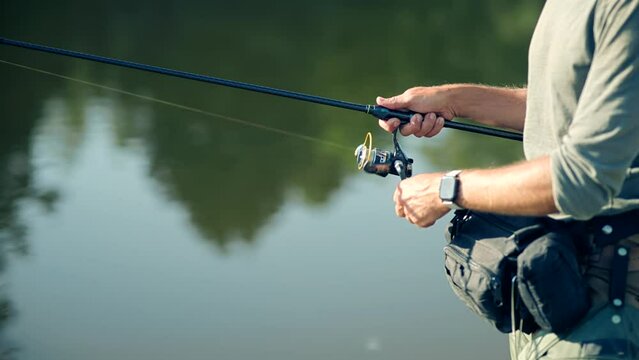 Fisher pilling perch . Angler ultralight catching pike	