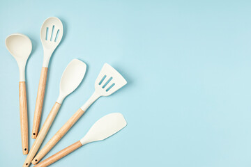 Pastel color kitchen utensils top view. Cooking blog, classes, workshop, recipe template concept