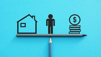 Picture of man between house and money. Choice between work and family