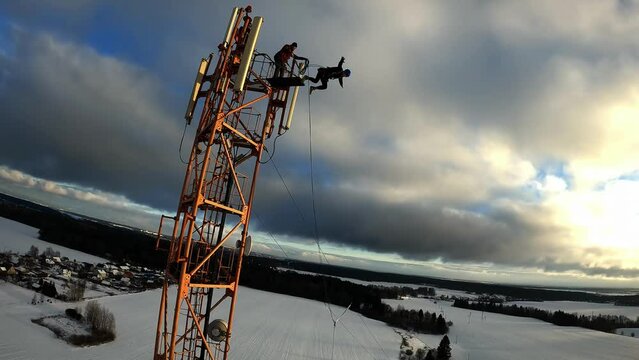 jump from a height, jump from a tower with belay, a girl jumps from a height with belay, a woman jumps from a tower with belay, 
Slow motion