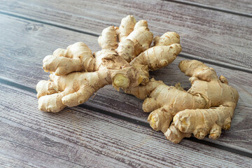Fresh organic ginger roots rhizome on display