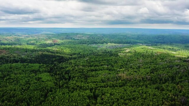 Southern Urals in the summer: Zilairsky district, Kizlar-Birgan Bashkir village. Aerial view.