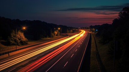 Fototapeta na wymiar Car light trails on the highway at night. glow lights on road