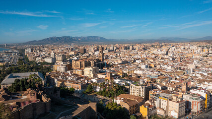 Fototapeta na wymiar Aerial photo from drone to the city of Malaga and old town Malaga at sunrise. Malaga,Costa del sol, Andalusia,Spain, (Series)