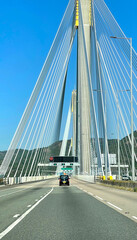 Fototapeta premium Hong Kong highway bridge building with clean blue sky at daytime