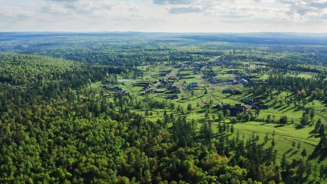 Southern Urals in the summer: Zilairsky district, Kizlar-Birgan Bashkir village. Aerial view.