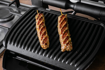 grilled sausages on the grill