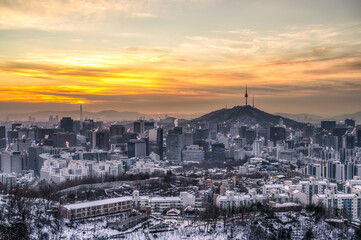 Seoul skyline, landmark, city on a snowy day, winter, view from Inwangsan Mountain Seoul, South Korea