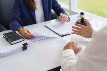Lawyer woman read contract and listening business data with problem of businessman in legal office