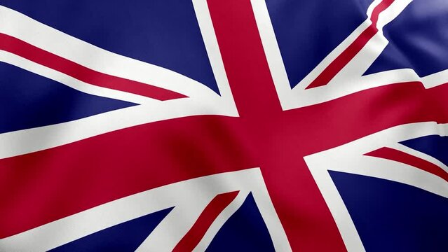 United Kingdom of Great Britain, Union Jack flag waving in the wind. Closeup in 4k of realistic British flag with highly detailed fabric texture