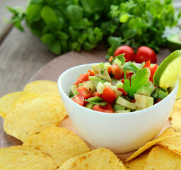 snack guacamole with corn chips nachos