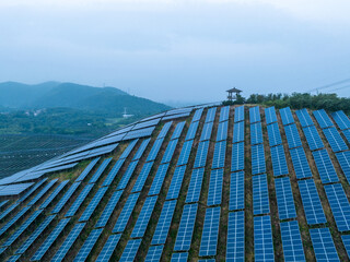 view of solar power panels on hill