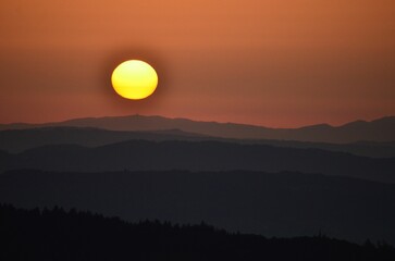 Sunset on the Schnebelhorn. Sun just before setting. Nice evening atmosphere. Zurich, Switzerland. High quality photo
