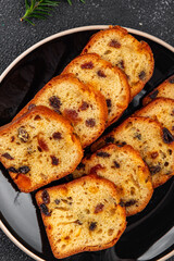 fruit cake pastry dried fruits cherries, dried apricots, prunes, raisins sweet Christmas sweet dessert holiday treat new year and christmas meal food snack on the table copy space food background