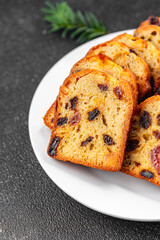fruit cake pastry dried fruits cherries, dried apricots, prunes, raisins sweet Christmas sweet dessert holiday treat new year and christmas meal food snack on the table copy space food background
