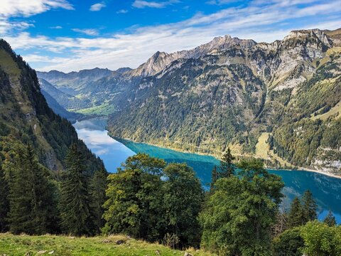 mountain lake in the Swiss mountains. Kl&ouml;ntalersee above Nestal Glarus. Wanderlust in autumn. High quality photo