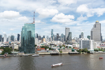 Fototapeta na wymiar Cityscape in Bangkok, Thailand.Luxury Asian corporate and residential lifestyle. Financial city downtown, real estate.